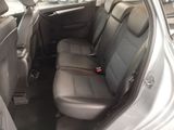 the back seats of a car are empty in the parking lot