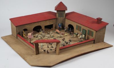 une maquette d'un bâtiment dans lequel se trouvent de nombreux animaux