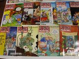 a lot of comic books on the table together