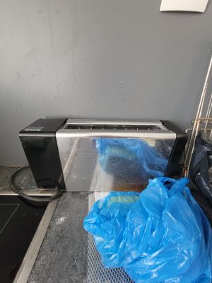 a blue bag sitting on top of a conveyor belt