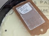 a pan with some food in it and a tag on it
