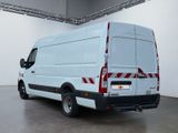 a white van that is parked in a room