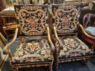 pair of antique carved wood chairs with upholstered upholstered upholstered upholstered upholstered upholstered upholstered