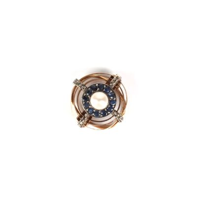 an image of a close up of a ring with a pearl in it