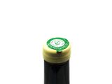a bottle of wine that is sitting on a table