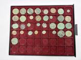 a red box with a lot of coins in it