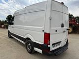 a white van that is parked in a lot