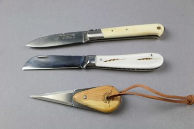 three different types of knives that are on the table
