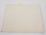 an old piece of paper with a piece of yellow paper sticking out of it