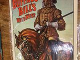 une affiche représentant un homme à cheval sur la couverture du livre *Buffalo Bill's Wild West*