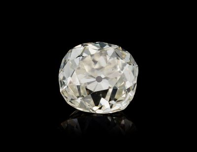 an oval cut diamond on a black background