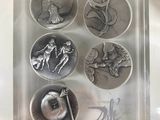 a picture of a picture of a set of silver coins