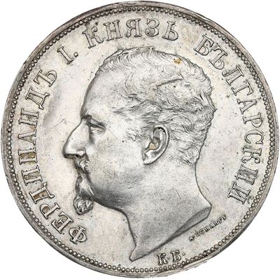 an old silver coin with a portrait of a man on it