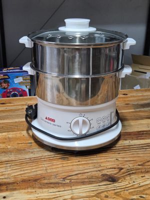 a large pot sitting on top of a wooden table