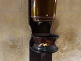 a water dispenser on the side of a building