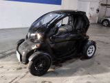 a small car that is parked in a garage