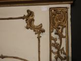a picture of a gold and white dresser in a room