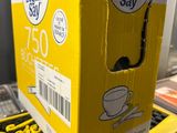 a box of coffee sitting on top of a counter