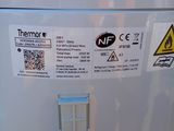 an image of a refrigerator with stickers on it