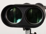 a close up of a pair of binoculars on a tripod