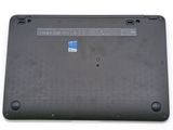 the back of a laptop with a blue sticker on it