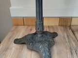 an image of a table with a lamp on top of it