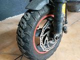 a scooter that is sitting on the ground