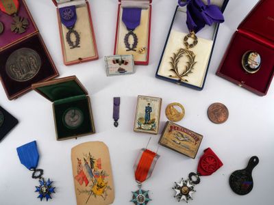 many medals and medals on display on a table