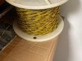 a spool with a spool on top of it on a box