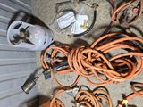 a lot of wires and tools that are on the floor