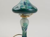 an image of a lamp with a blue and green glass shade on it
