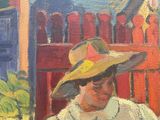 painting of a woman sitting in a chair with a straw hat on