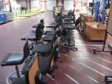 many chairs lined up in a large warehouse