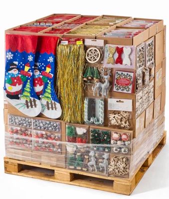 a wooden crate filled with assorted christmas decorations
