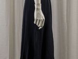 an image of a mannequin wearing a white shirt and black skirt