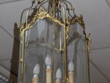 a chandelier hanging from the ceiling in a store