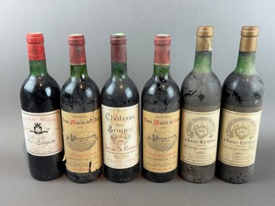 six bottles of wine are lined up in a row on a table