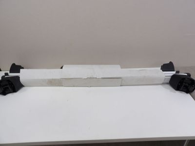 a piece of paper on a white table with black handles