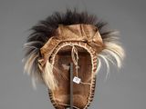 an image of a hat with a feather on it
