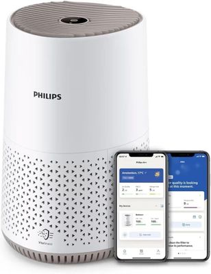 Le purificateur d'air intelligent Philips est présenté à côté d'un iPhone