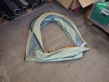 a tent that is laying on the floor in the room