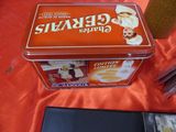 a tin box with a picture of a woman on it