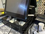 an image of a cash register with a monitor on it