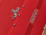 the ferrari ipad case is open on a table with a ferrari logo on it