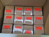 a box full of boxes that are wrapped in plastic