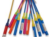 a lot of different colored sticks that are on the table