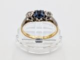 an image of a blue sapphire and diamond ring
