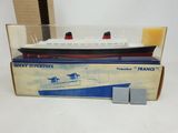 an image of a model of a boat in a box on a table