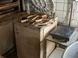 an image of a kitchen with a lot of tools on the counter