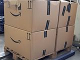 a pallet with boxes stacked on it in a warehouse